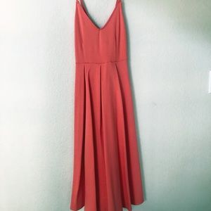 V-neck midi dress. Orange pink tone